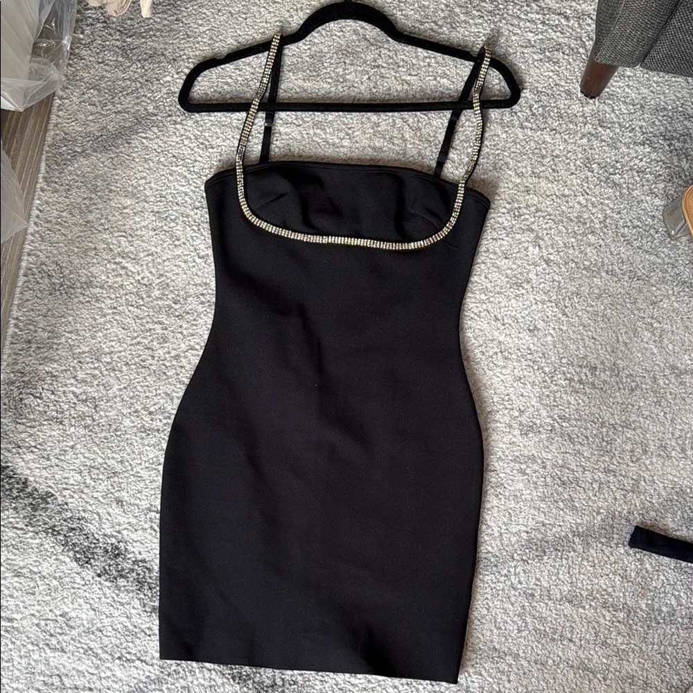 Elegant Black Dress with Embellished Neckline